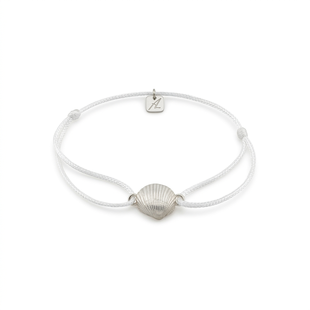 Die Herzmuschel aus Wassersleben S in 935/- Silber und Textilband für den Arm
